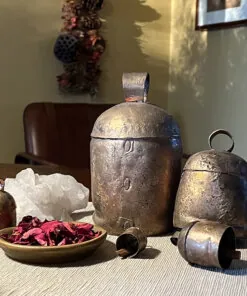 Bronze bells with rose petals and crystal